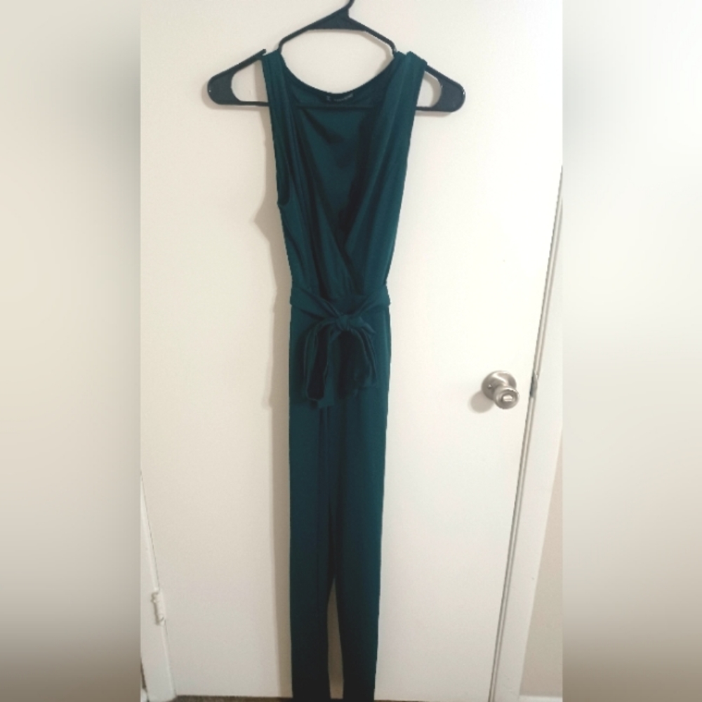 Emerald green jumpsuit with black lace